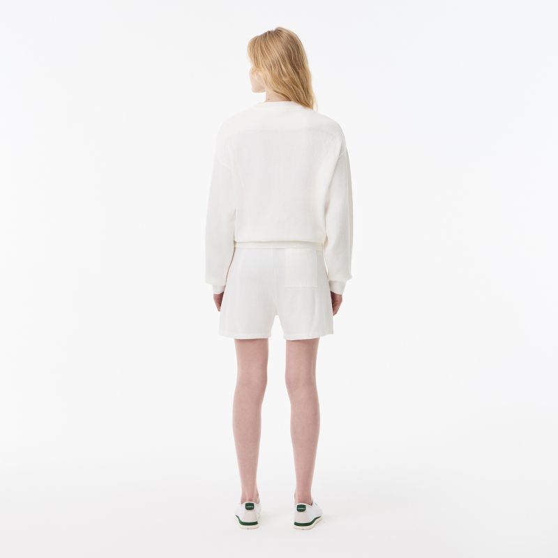 Женский свитер Lacoste