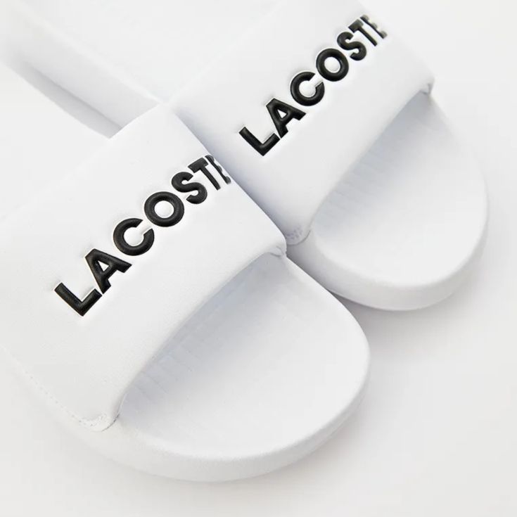 Женские сланцы Lacoste