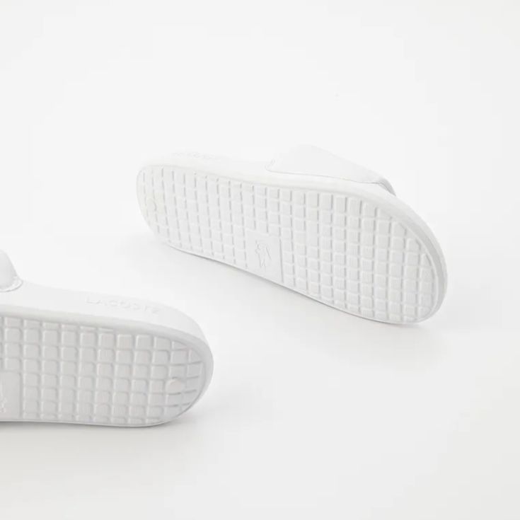 Женские сланцы Lacoste