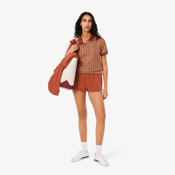 Женское поло Lacoste