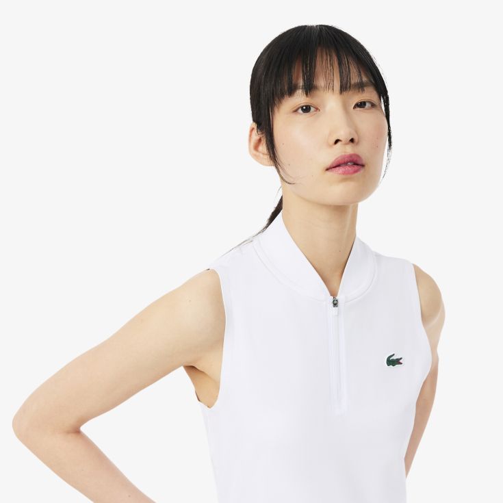Женское поло Lacoste
