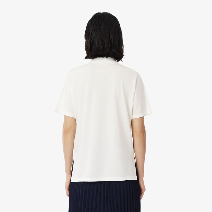 Женское поло Lacoste