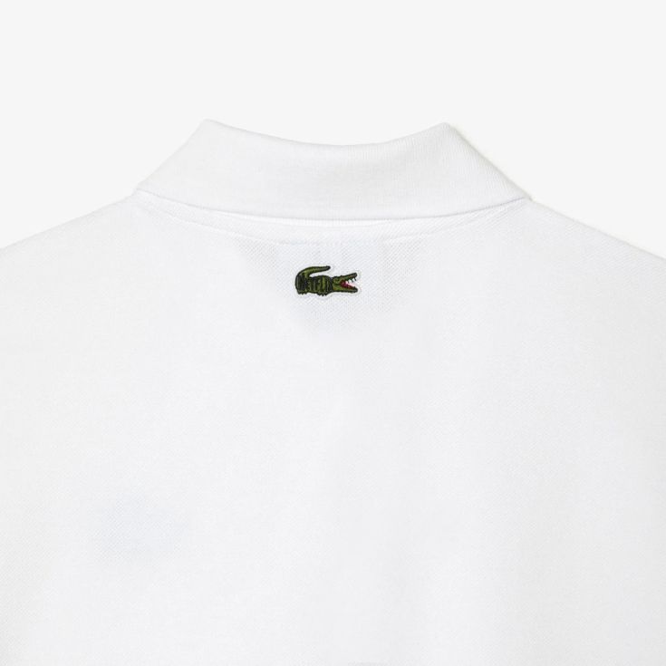 Женское поло Lacoste