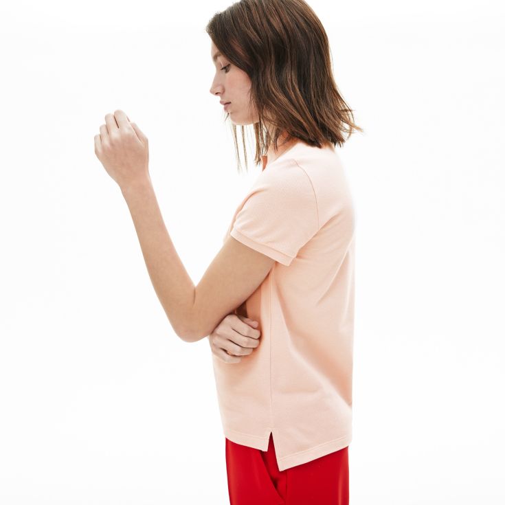 Женское поло Lacoste
