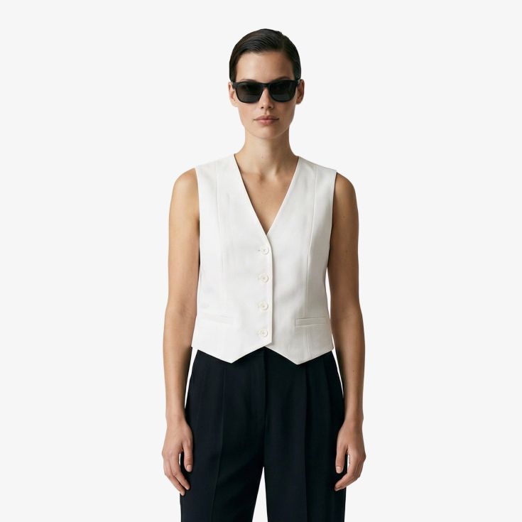 Женское поло Lacoste